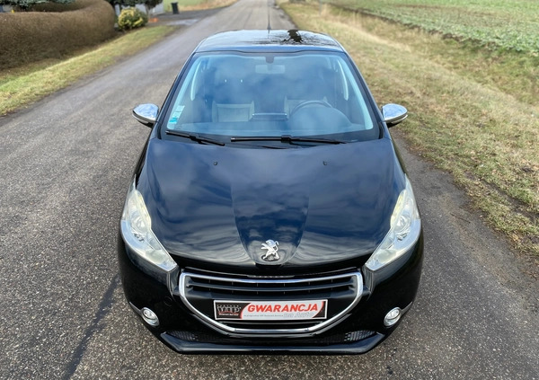 Peugeot 208 cena 26890 przebieg: 148463, rok produkcji 2014 z Strzyżów małe 781